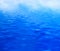 Clean water background, calm waves. Blue reflection