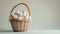 A clean, white background adorned with a single, intricately designed Easter basket filled with eggs
