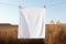 Clean white sheet drying on a line. Laundry with clothes pins on a rope outdoors. Clean clothesline dry laundry line. Empty space