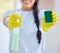 Cleaner woman, spray and sponge with gloves for hygiene, safety and chemical for dirt, house work and job. Cleaning