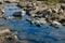 Cleanest river water flowing inbetween the rocks in Karnataka, India