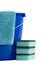 Cleaning cloth a blue bucket and 3 scrubbers