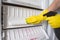 A cleaning lady washes the freezer. Cleaning the refrigerator. Selective focus. Copy space.