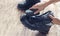 Cleaning shoes on wooden background