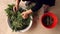 Cleaning and slicing green dandelion plants