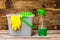 Cleaning sprayer anti bacterial sanitizer spray isolated with mop bucket and yellow gloves, concept of infection control.  Plastic