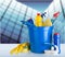 Cleaning supplies in bucket isolated