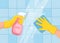 Cleaning surface. Hands with spray bottle and cloth wiping bathroom tile wall. Cleaning or disinfecting surfaces in