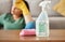 Cleaning, tired and woman with spray bottle in living room for , housework and maid service. Furniture, housekeeping and