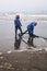 cleaning up oil spills on the beaches of lima with the repsol company in lima peru in the year 2022