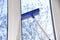 Cleaning of vinyl plastic window. squeegee tool