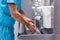 Cleanliness concept. male doctor washing hands after operation