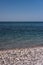 Clear blue-blue sea with a rocky shore. Black sea coast