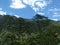 Clear blue sky and tall green mountain view of mechuka   , arunachal prades, India