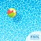 Clear blue swimming pool water background with floating beach ball