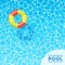 Clear blue swimming pool water background with floating pool toy