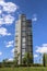 Clear cloudy blue sky in the background in summertime and modern luxury high-rise apartment buildings