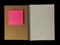 Clear color note book opened for note or lecture note or memo for remine and brown cover whit pink color post note or postit in b