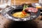 Clear Fish soup served in a bowl in restaurant