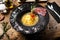 Clear Fish soup served in a bowl in restaurant