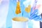 Clear golden luminous sugaring paste for depilation looks like caramel or lollipop