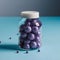 Clear jar filled with purple spherical objects, white cap, on light blue surface