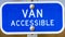 Clear Panorama Blue sign with a Van Accessible text on a parking area for handicapped people