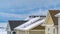 Clear Panorama Close up view of the exterior of snowy homes during winter season
