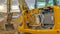 Clear Panorama Construction site with an excavator against a dramatic sky filled with clouds