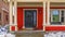 Clear Panorama Entrance of a red home with a pathway and stairs leading to the door and porch
