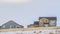 Clear Panorama Facade of houses with a boundless cloudy sky background in winter