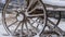 Clear Panorama Old fashioned wooden wagon with rusty wheels on a frosted hill in winter