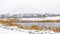 Clear Panorama Panorama of a lake in Daybreak Utah with wooden decks and snowy shore in winter