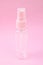 Clear pink plastic bottle spray