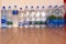 clear plastic water bottles stored along white wall during the Covid-19 isolation period