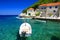 Clear sea and old stone houses on Island Lastovo, Croatia