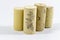 Clear shot of multiple wine corks with blurry white background