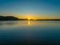 Clear skies sunburst sunrise waterscape