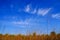 Clear sky above the farm fields in the rural district of Moldova. Autumn landscape.