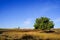 Clear sky above the farm fields in the rural district of Moldova. Autumn landscape.