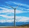 Clear sky and enormous windmills.