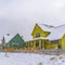 Clear Square Appealing homes amid an icy landscape on a cloudy winter day in Daybreak