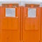 Clear Square Close up view of a bright orange portable restroom in Daybreak Utah