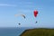 Clear summer afternoon Mussel Rock California Hand Gliders enjoying the wind