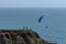 Clear summer afternoon Mussel Rock California Hand Gliders enjoying the wind on a take off