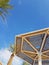 Clear sunny sky and beach umbrellas in Eilat resort; Israel