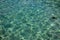 Clear tropical sea water texture. Seawater closeup photo. Still sea lagoon surface. Transparent water of tropic seaside