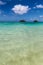 Clear turquoise water and two islands view at Lanikai beach, Oahu