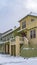 Clear Vertical Wet and snowy pathway in front of adorable homes in Daybreak Utah