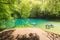 Clear water of Gouffre Saint-Sauveur in France during summer